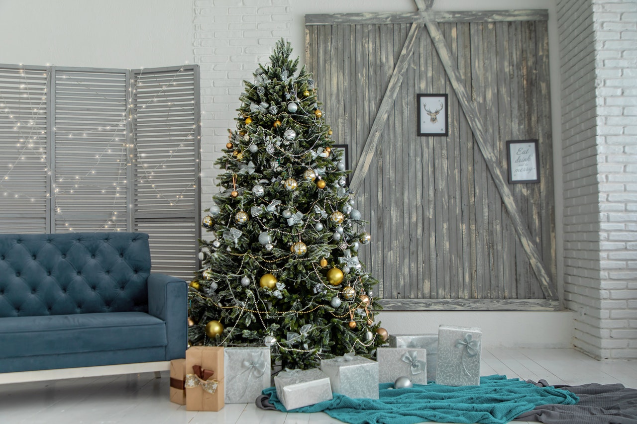Christmas tree with blue sofa